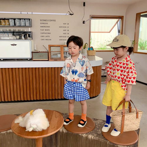 Children's short-sleeved shirts 2023 summer Korean style boys and girls lapel tops baby printed shirts fashionable brother and sister outfits