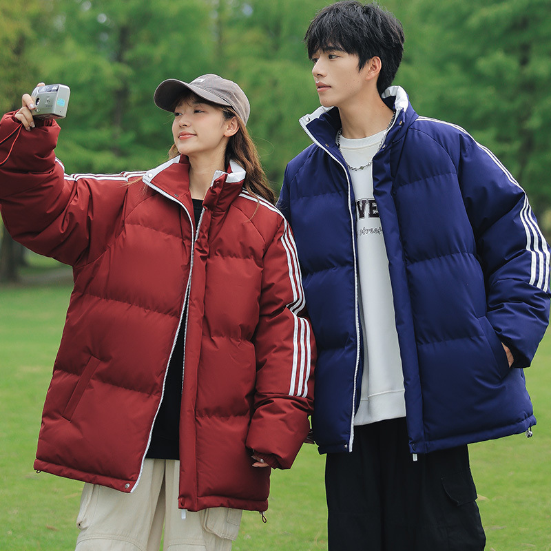 Ropa de invierno de tres barras de color contraste chaqueta de pluma para hombres invierno nuevo engrosado abrigo caliente de cuello vertical abrigo caliente a prueba de viento para hombres y mujeres