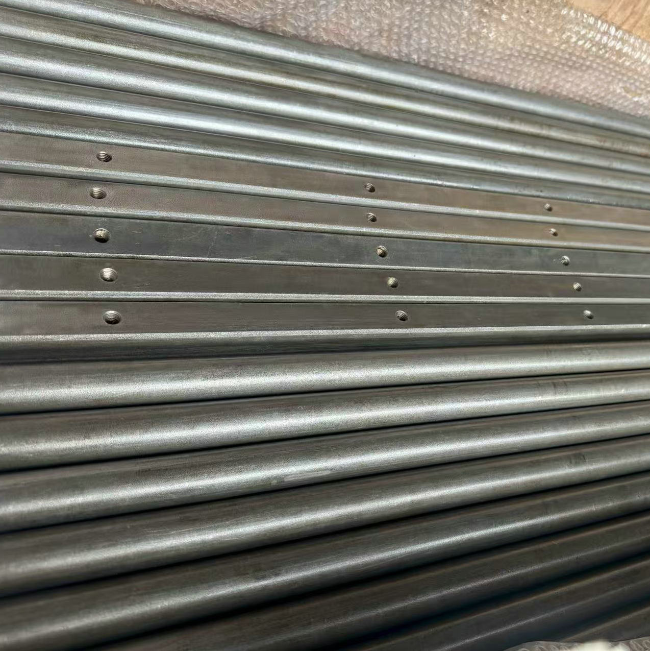 ��������ѹ����� ���ֽ�������óũ����е���ѹ����ᶨ�Ƽӹ�