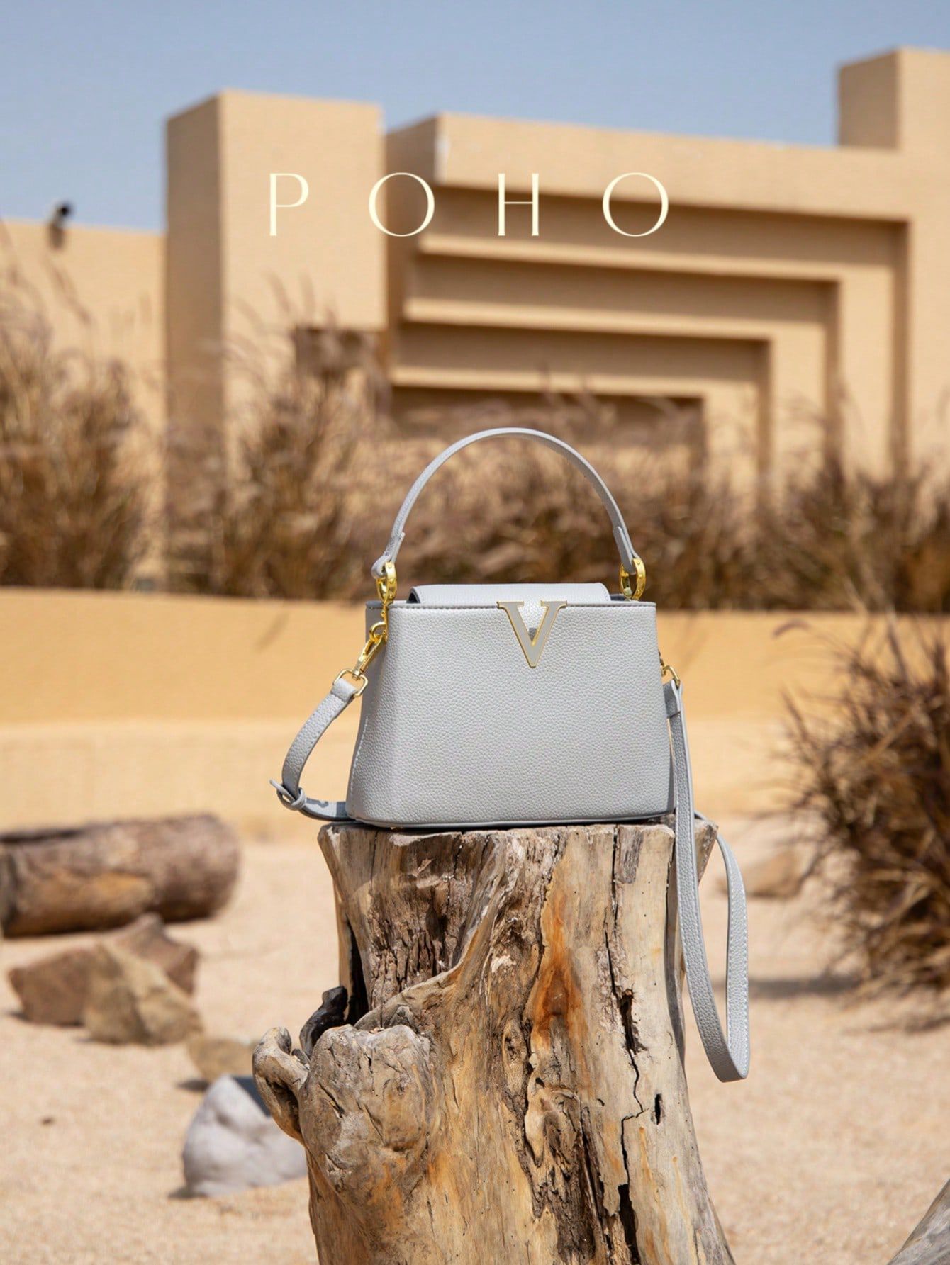 Nuevo poho2025 simple decoración en forma de V portátil estilo extranjero hombro de moda balde de moda bolsa de mujer