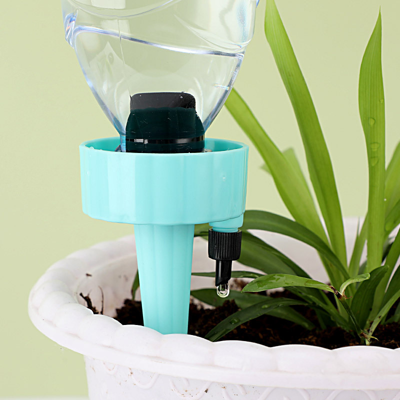 El nuevo dispositivo de riego automático para el hogar, la válvula de riego perezoso, el filtro de flujo de agua de tiempo ajustable, el dispositivo de goteo