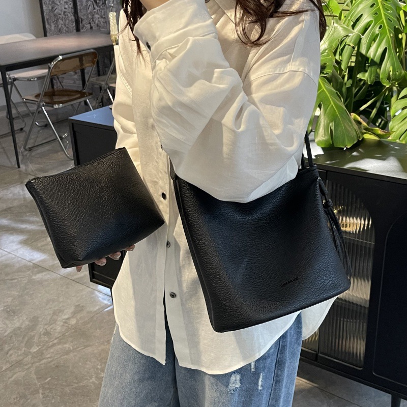 Bolso de cubo de textura transfronteriza 2025 verano nuevo bolso femenino estilo ins bolso de hombro simple