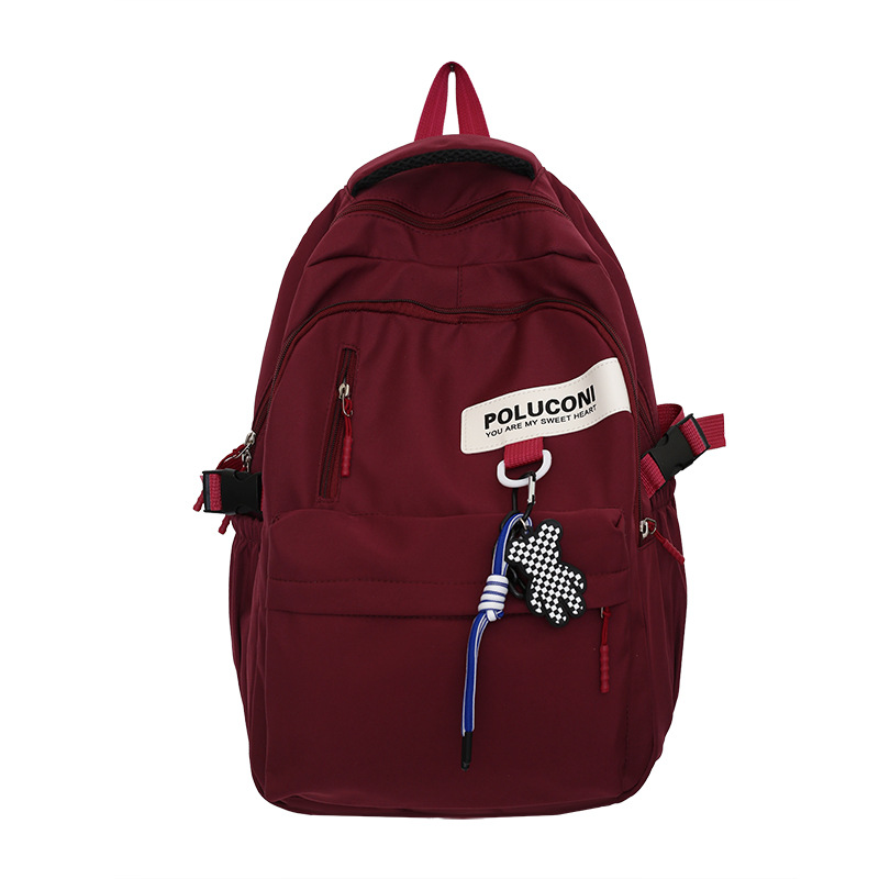 Al por mayor nueva escuela secundaria estudiante mochila hombres y mujeres de gran capacidad Moda mochila coreana casual viaje mochila