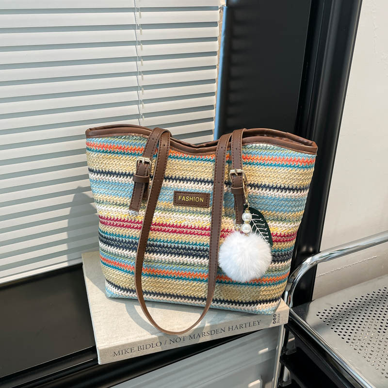 2026 nuevo arco iris trenzado bolso de hombro de gran capacidad de mujer bolso de paja de viaje universal mano de moda rayas