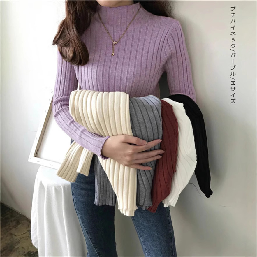 日本式のレースの半高襟のセーターの底のシャツの女性の秋冬の修身の中に白い上着を掛けます。