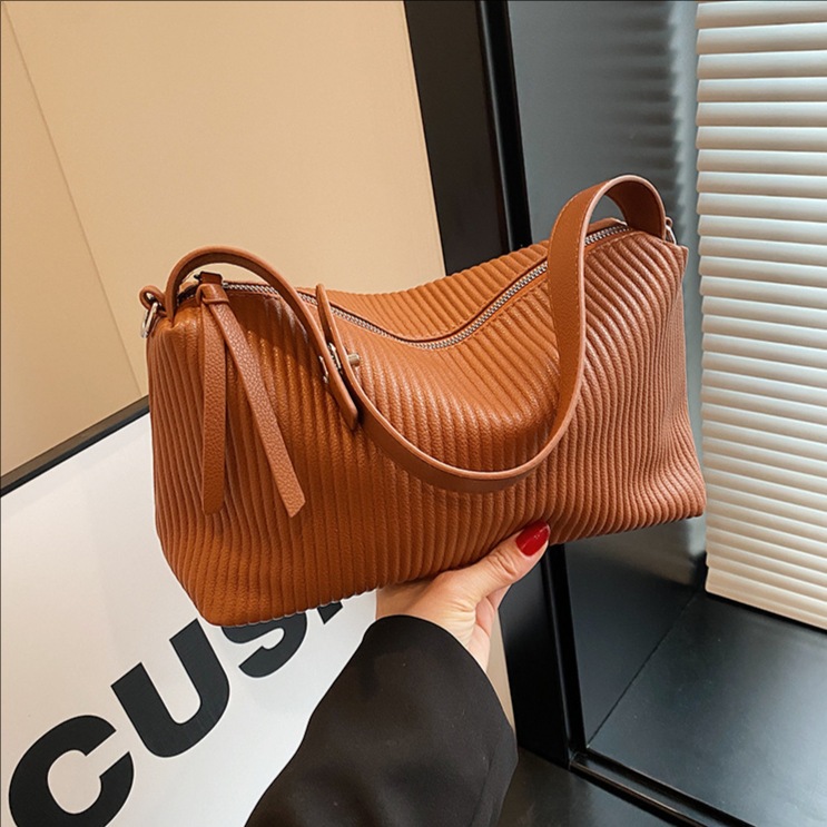 Bolsa de almohada portátil transfronteriza alta sensación de brazo bolso para mujeres 2025 nuevo otoño invierno de moda bolso de hombro bolso plegado