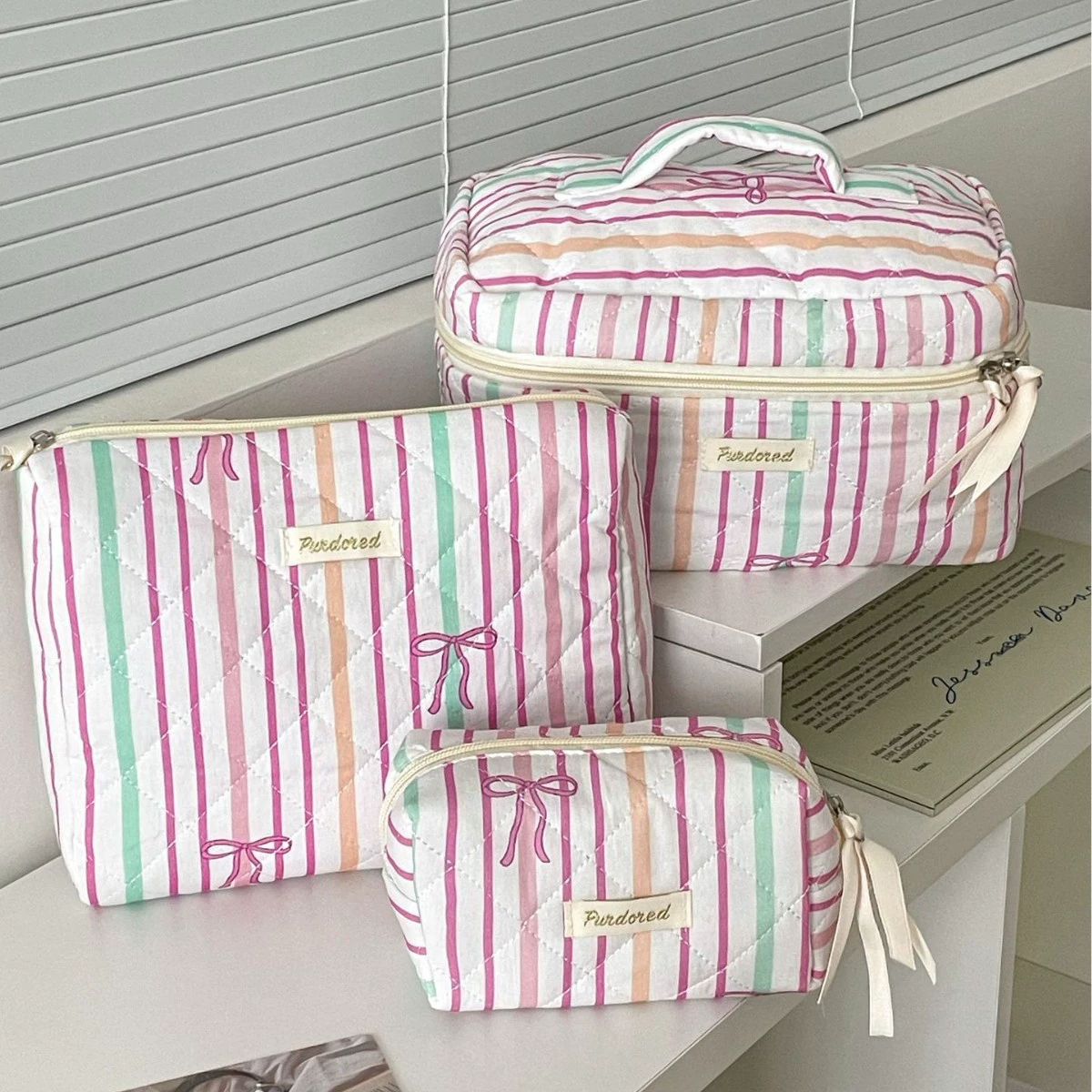 Capacious cosmetic bag with bow, handheld soft organizer bag, flowered