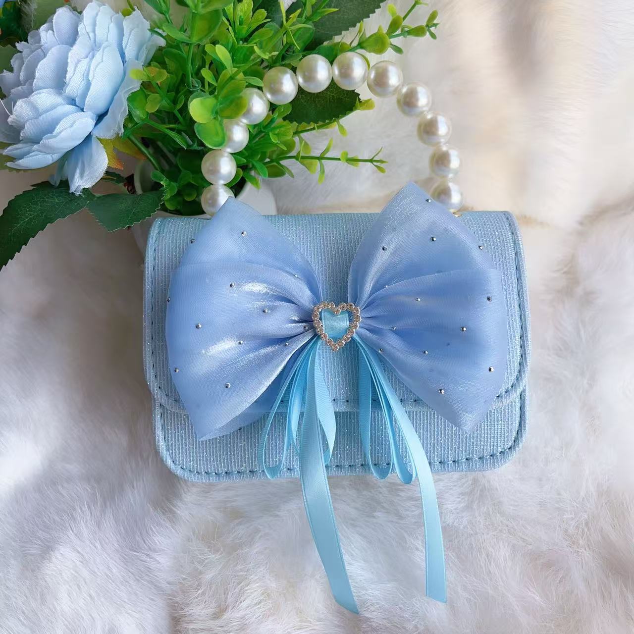 Nuevo tipo de bolsos para niños, bolsos de moda, bolsos de princesa de viento, bolsos portátiles lindos para chicas, bolsos de red para bebés.