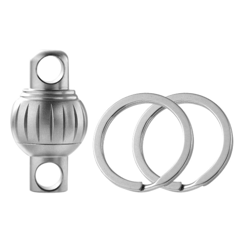 Llavero multifuncional portátil de aleación de titanio, de gran venta del fabricante, con cierre de anillo giratorio de liberación rápida para coche, con alta capacidad de carga.