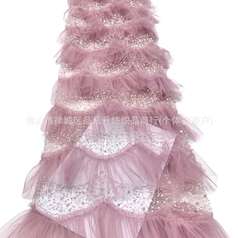 Falda de pastel laminada hecha a mano hilo de malla de perlas ligero lujoso vestido de aire de hadas de estilo de moda alta tela de vestido
