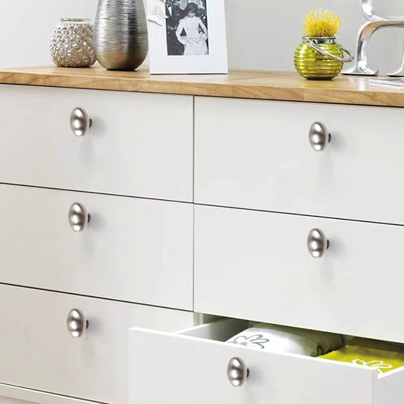 Egg-shaped drawer pull with a single hole, Nordic gold glossy black cabinet and wardrobe furniture round handle