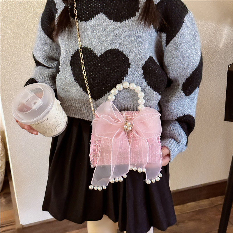 Bolsos de moda de moda para niños, arco de arco, nuevo bolso, cambio de chicas, mochila transfronteriza