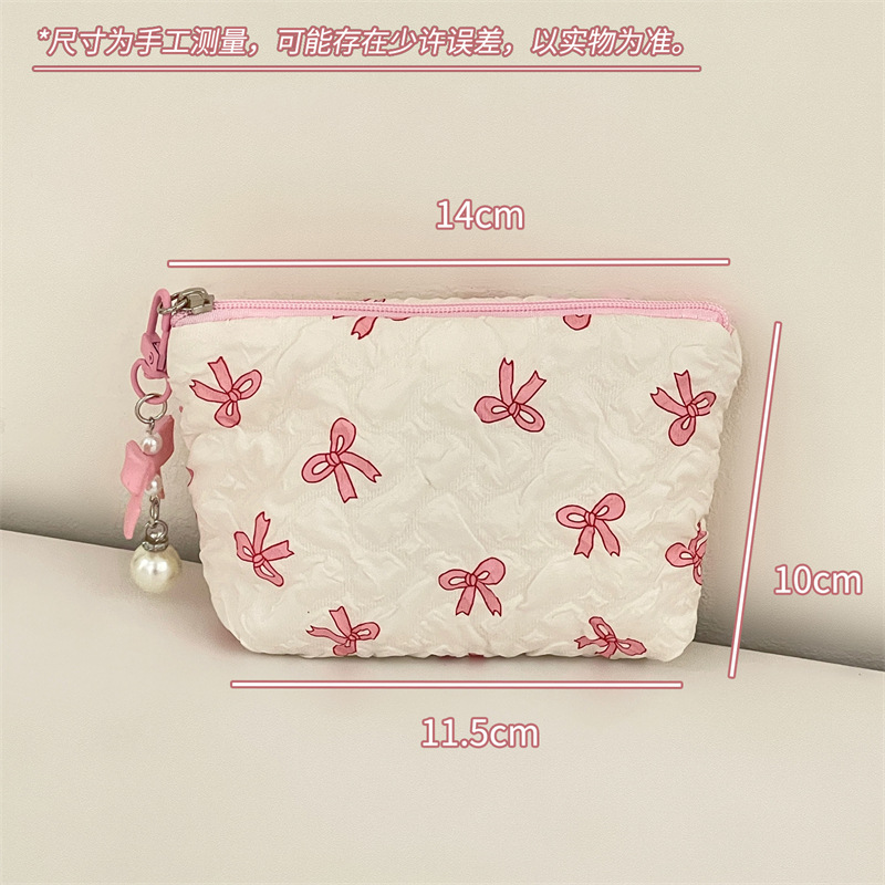 Nueva bolsa de almacenamiento de dormitorio de estudiantes de nicho de arco de maquillaje portátil de gran capacidad para salir a lavar