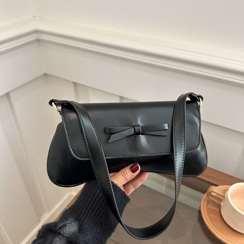 Bolsa de moda francesa de estilo extranjero 2025 primavera nuevo estilo retro nicho diseño popular personalidad mochila de hombro