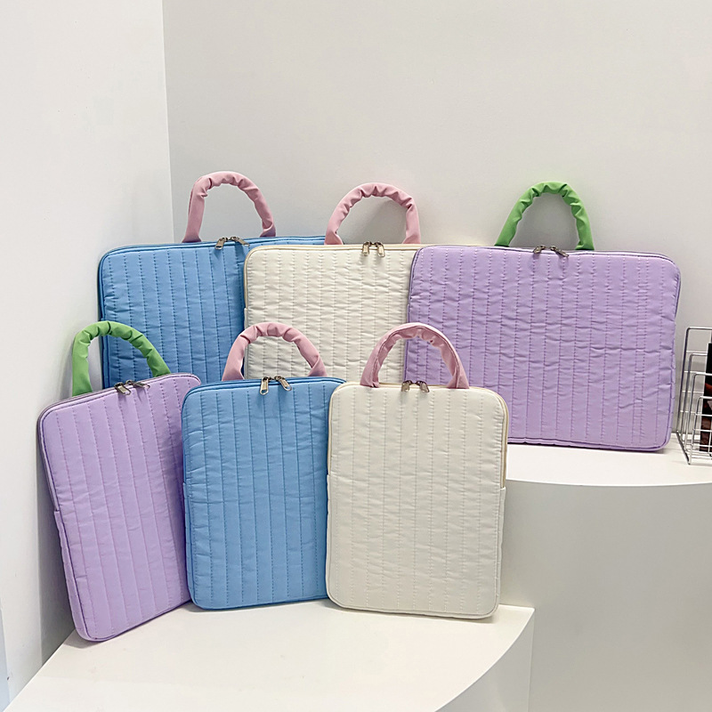 Coreano pequeño bolso de revestimiento portátil de color fresco 11 pulgadas bolso iPad 14 pulgadas bolso de computadora portátil antichoque