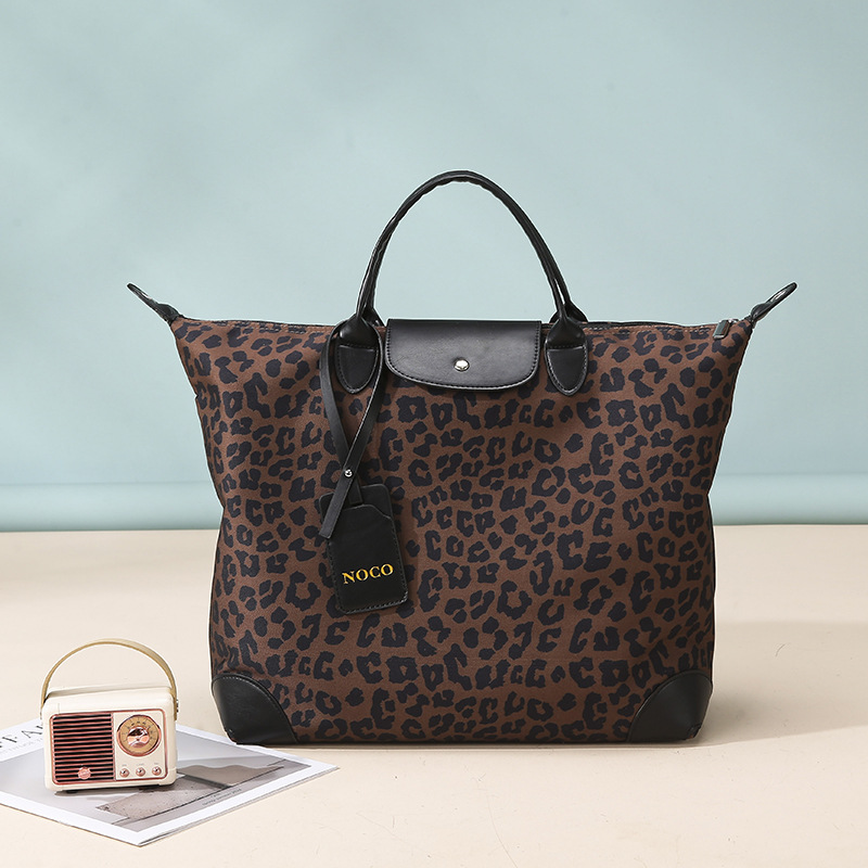 Bolsa de viaje de leopardo transfronterizo, bolsa de yoga, bolsa deportiva de ocio de gran capacidad para mujeres, bolsa de musculación de moda europea y americana.