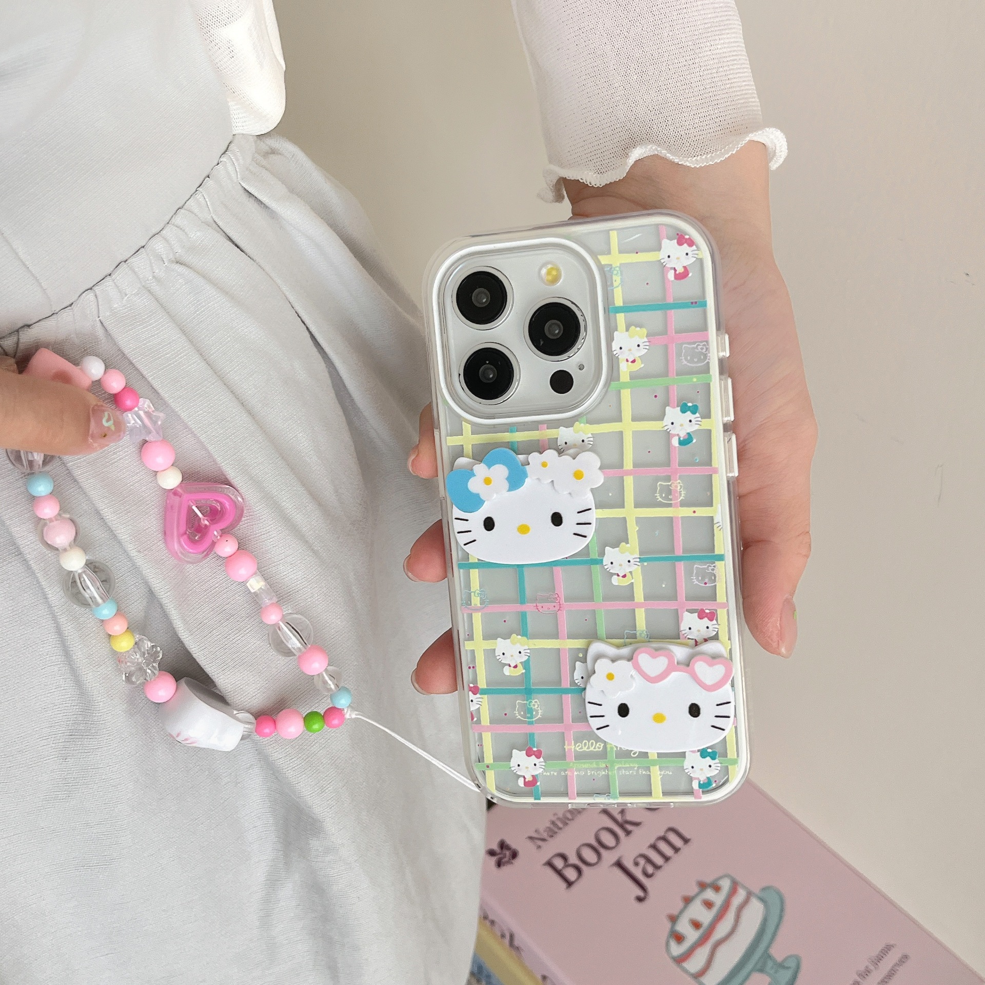 Divertido gato KT a rayas de color de dibujos animados para Apple 16ProMax personalidad 15Pro funda para teléfono móvil 14/13 nuevo 16