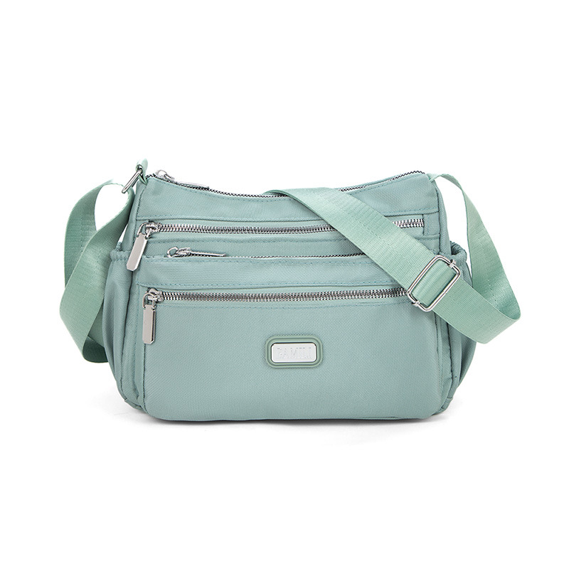 Bolso bandolera de tela Oxford para mujer 20247 nuevo bolso de mujer de mediana edad, bolso de madre de nylon de viaje de gran capacidad, todo fósforo