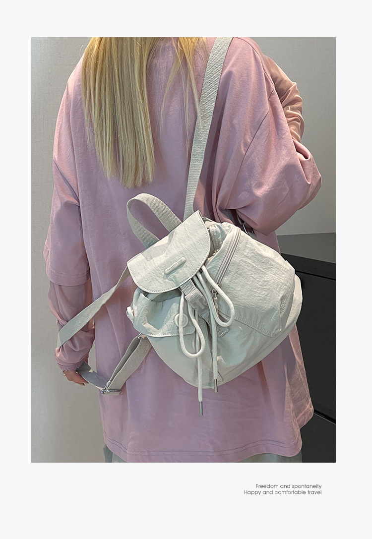 Colorful Fox's new Korean-style ins women's niche design lightweight pocket button drawstring backpack undefined