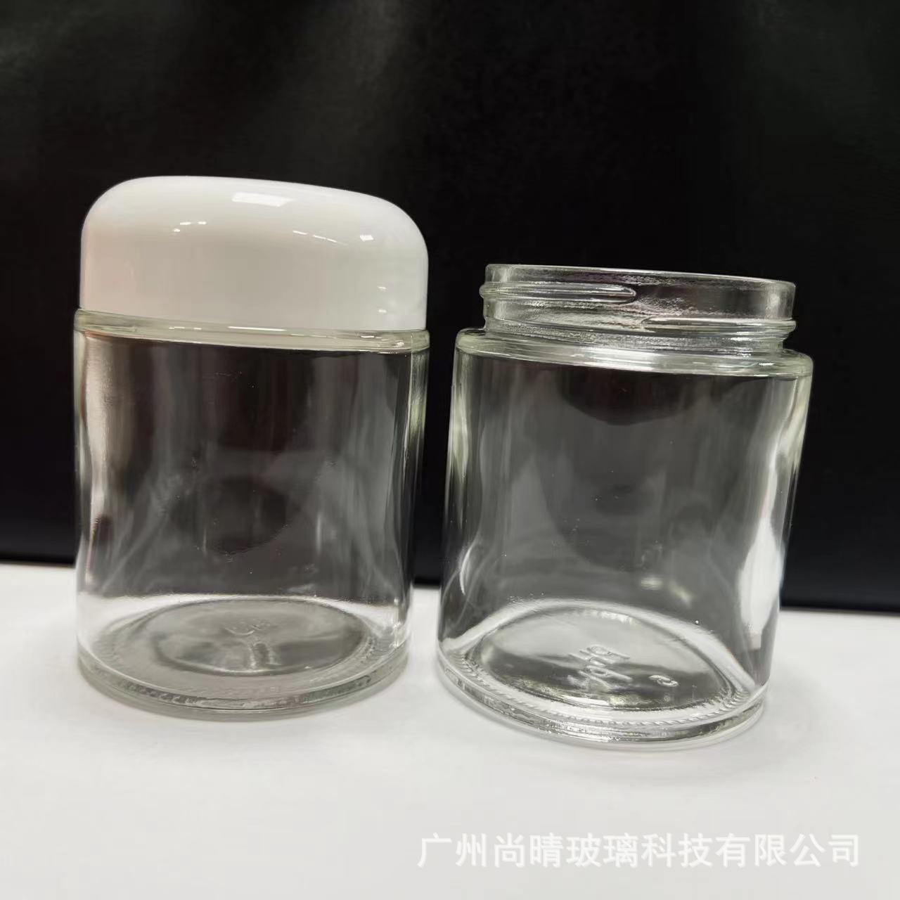 Ventas directas de fábrica 15-100g botella de ungüento de boca ancha transparente cúpula botella de crema cosmética botella de crema de vidrio 50g