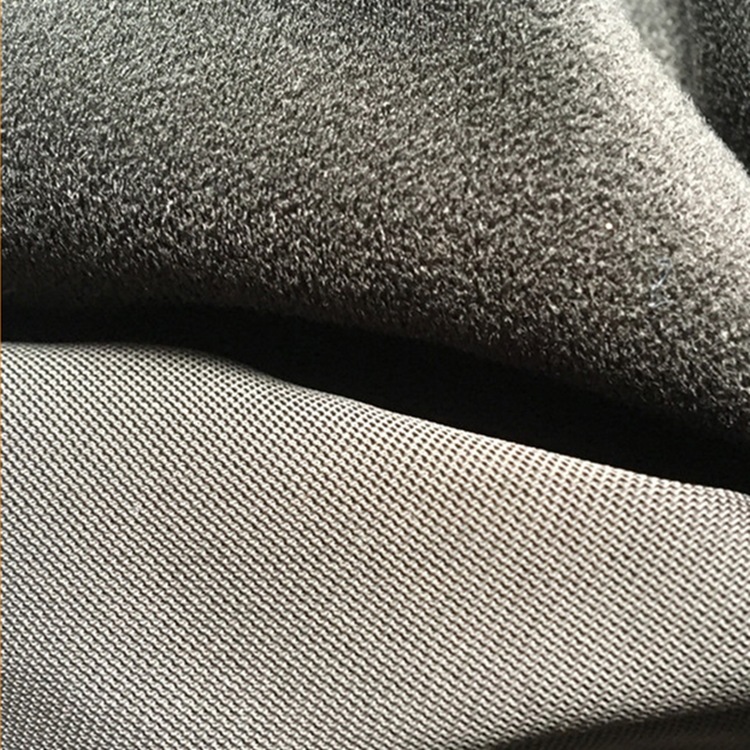 工厂在线涤纶经编拉毛布针织单面拉绒纤绒服装面料植绒布透气轻薄