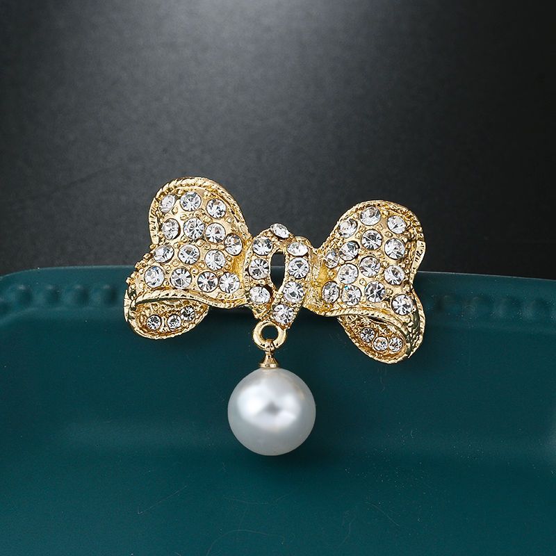 Broche à nœud papillon tendance en alliage anti-exposition haut de gamme, incrustée de diamants, style Coran, ornée de strass._voghion.com