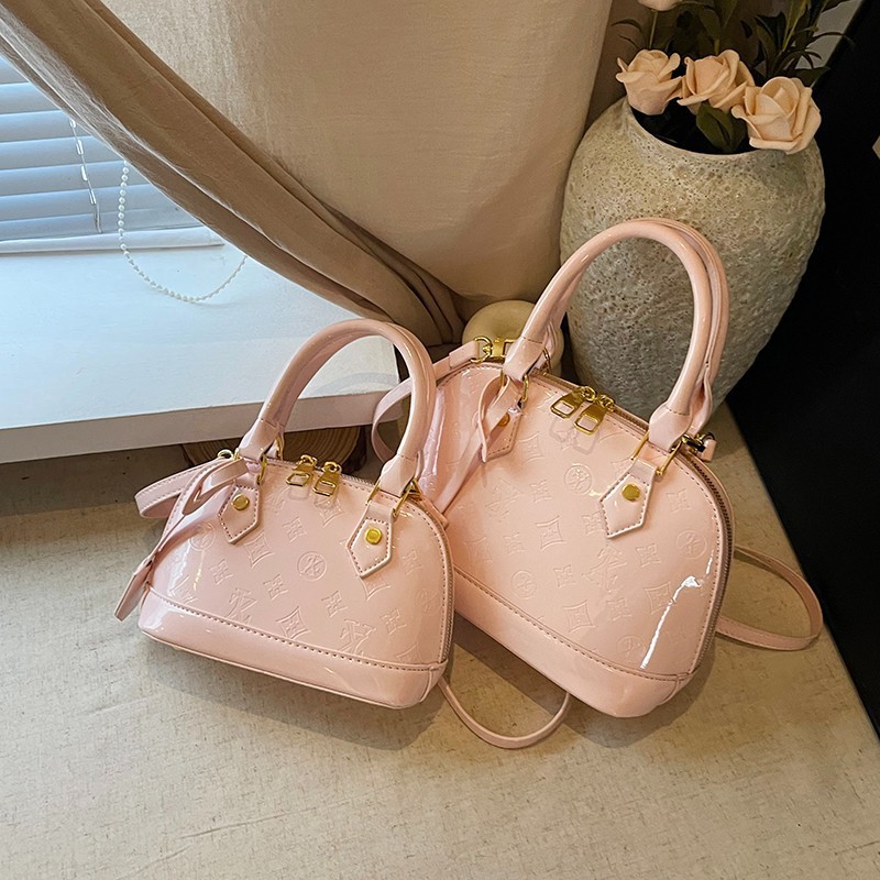 Guscio con lettere in rilievo, sensazione di alta qualità, design di nicchia, semplice e casual, versatile per il pendolarismo, da donna_voghion.com