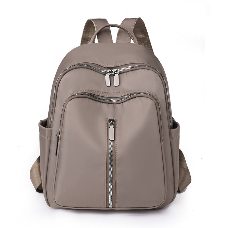 Spot al por mayor 2023 nueva mochila de nailon para mujer coreana simple y ligera mochila de viaje al aire libre mochila escolar de moda