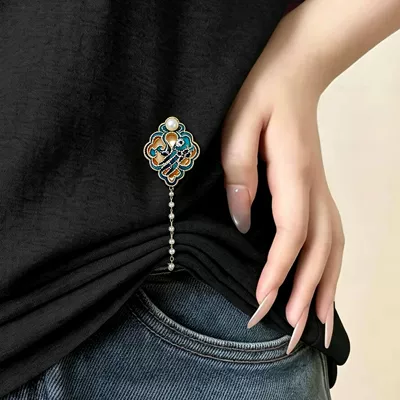 Chinese-style enamel phoenix brooch, Yaxa sancaqları