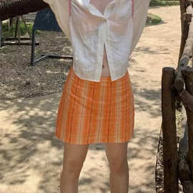 美式辣妹橙色格纹竖条印花半身裙女2026夏性感低腰防走光A字短裙