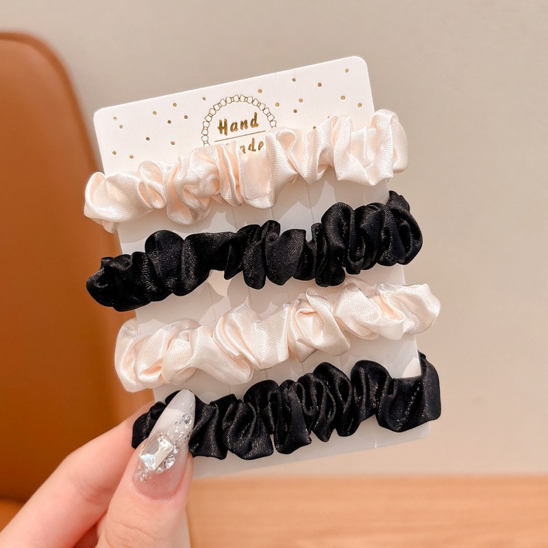 Niños coreanos de alta elasticidad y duradera anillo de pelo de intestino delgado 2024 nuevo estilo de niña simple atar el cabello de banda de goma