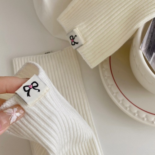 New Korean bow cloth label double needle socks for women's mid-long tube pile socks Korean simple calf socks white