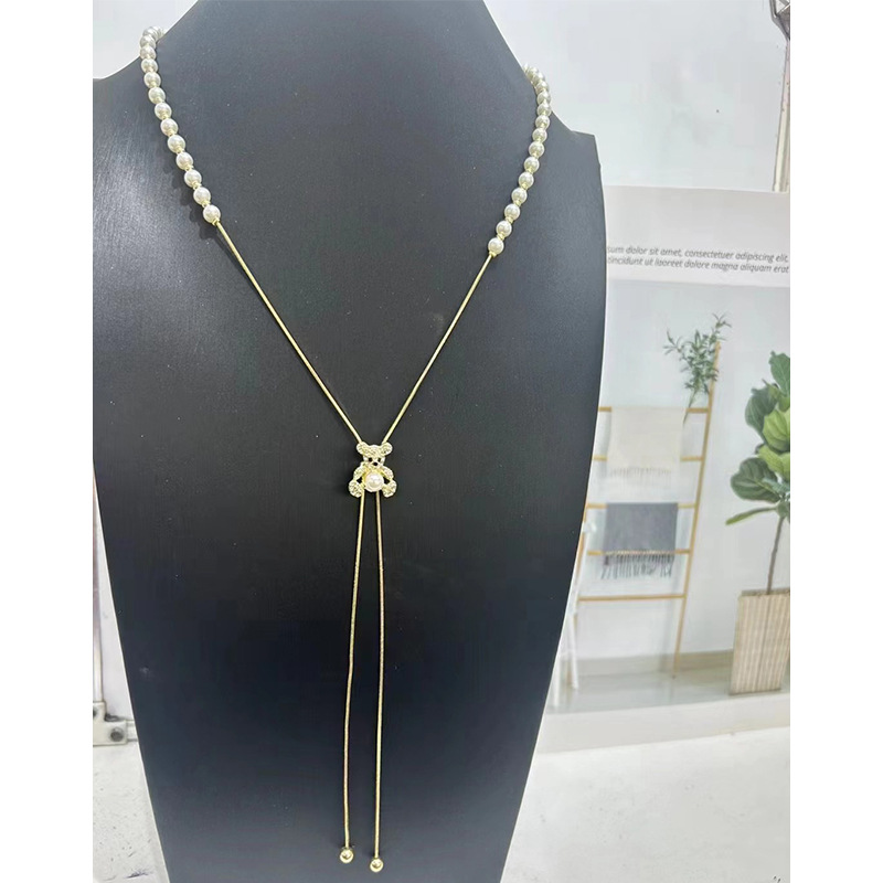 Collier de perles à tirer pour femme, chaîne ras du cou à pompon papillon haut de gamme et polyvalente, chaîne tendance unique pour pull_voghion.com
