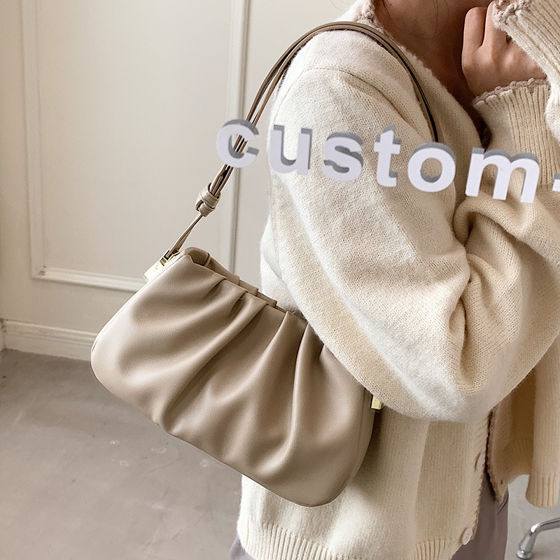 Nicho diseño moda simple bolsa 2023 nuevo bolso de las mujeres retro textura mensajero bolsa popular plisada bolsa de la axila