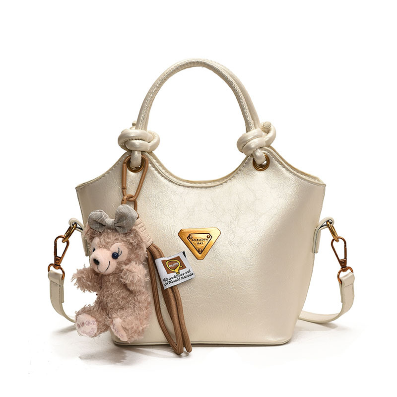 Bolsa de cubo de moda coreana retro primavera y verano nueva moda bolso de hombro de estilo de moda para trabajar textura personalidad mochila