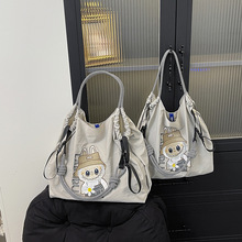 2025早秋新款刺绣拉布布手提单肩包学生大容量休闲可爱卡通斜挎包