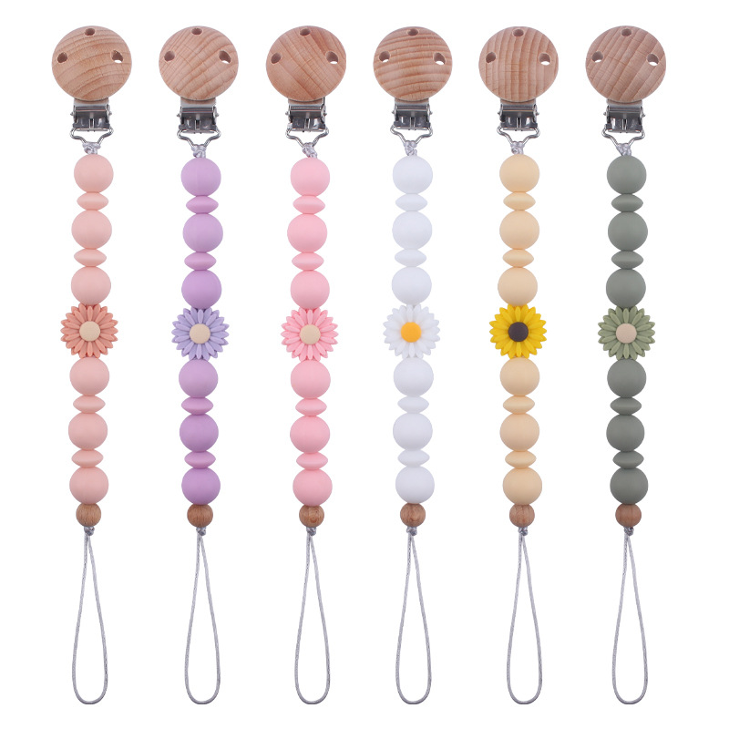 Nuevos suministros para bebés clip de chupete de haya calmante bebé dibujos animados margarita silicona anti-gota cadena chupete cadena