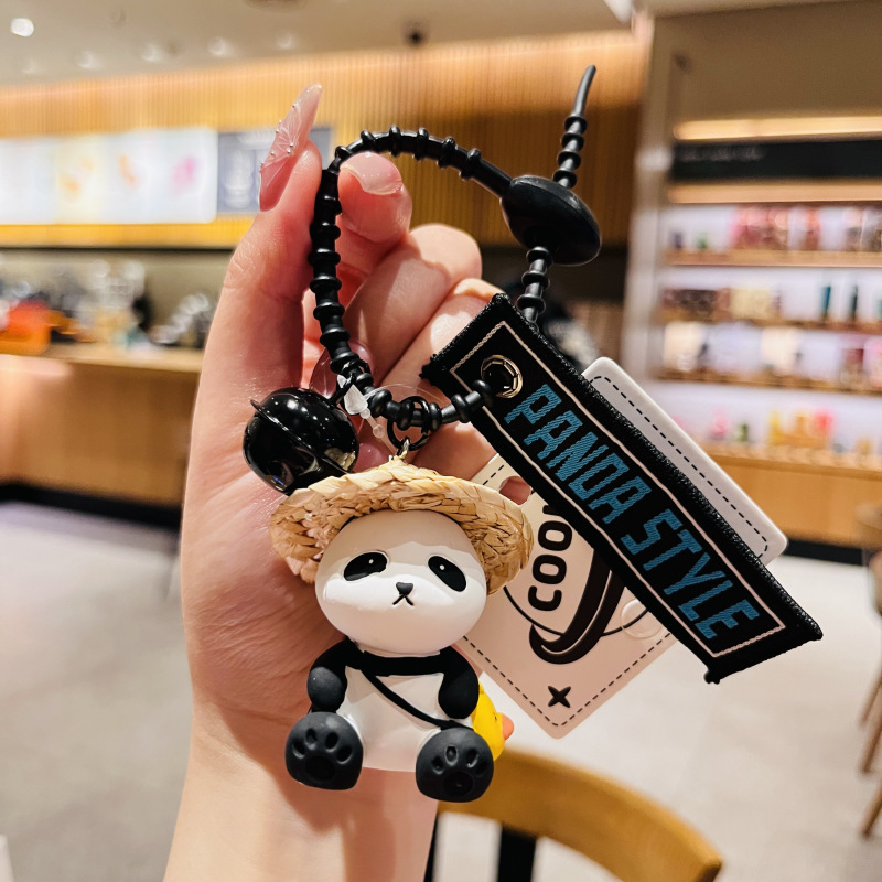 Genuine straw hat little friend Panda series creative cartoon hand rope keychain Bell pendant small gift wholesale