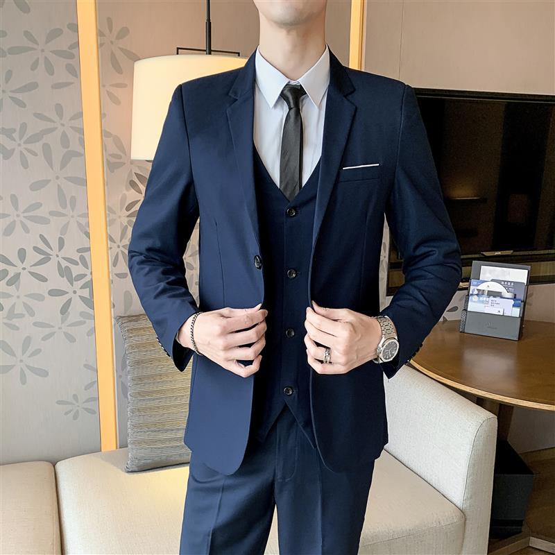 Traje azul marino de un botón + chaleco + Pantalones de traje con cinturón de corbata