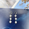 Organic silver needle, earrings from pearl with tassels, silver 925 sample