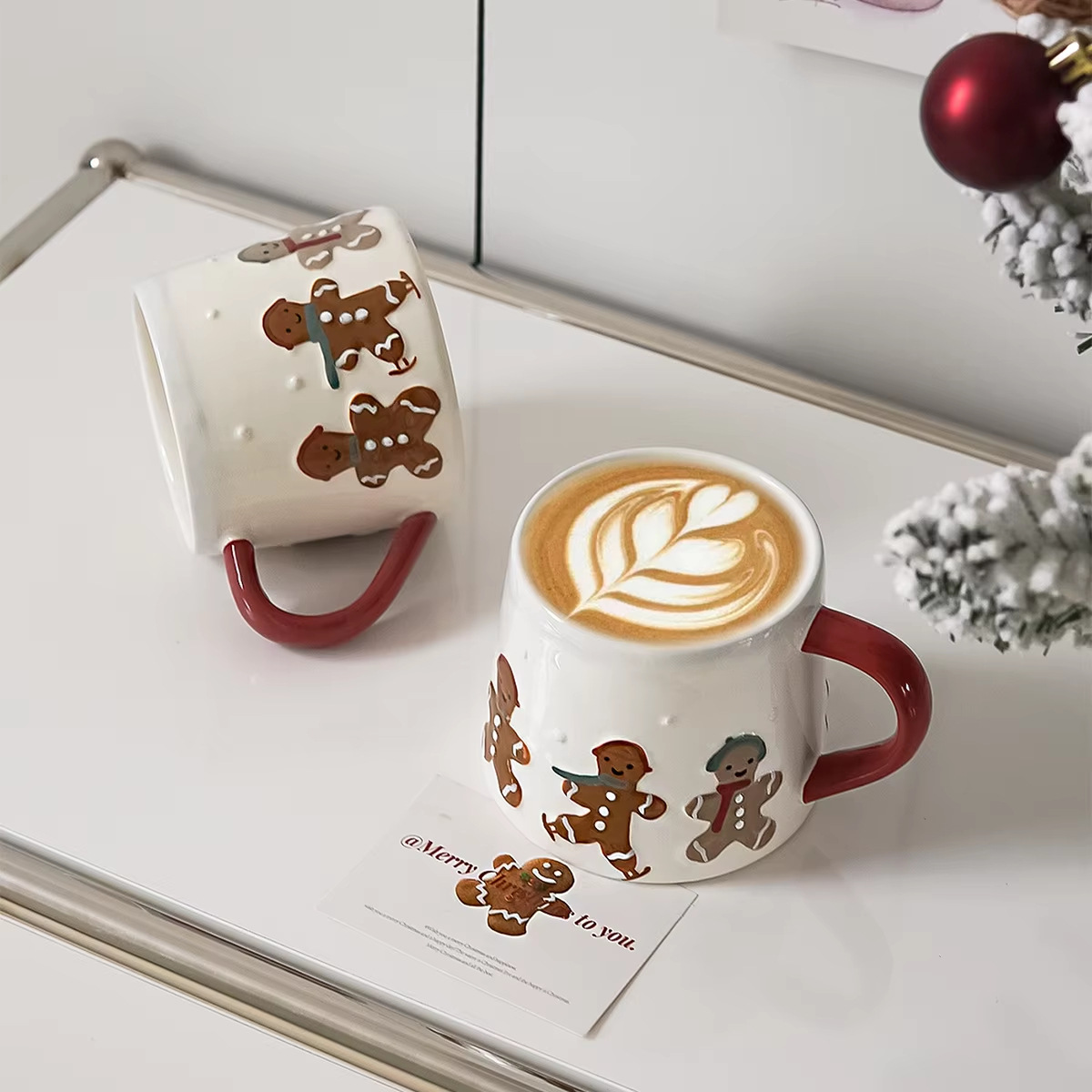 Navidad jengibre hombre patrón taza de cerámica mango de color contraste taza de café de cerámica Qin Sheng taza de agua de cubiertos domésticos