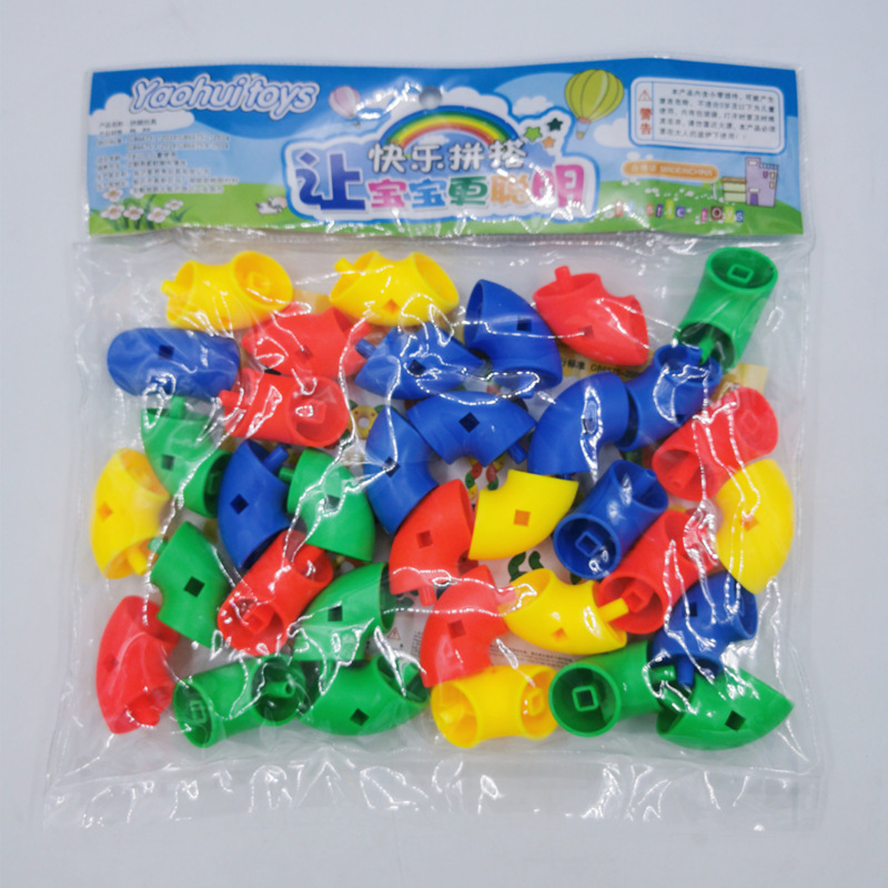 Bloque de copo de nieve de jardín de infancia al por mayor transfronterizo montaje puesto de juguete de escritorio a granel rompecabezas tubo de rueda