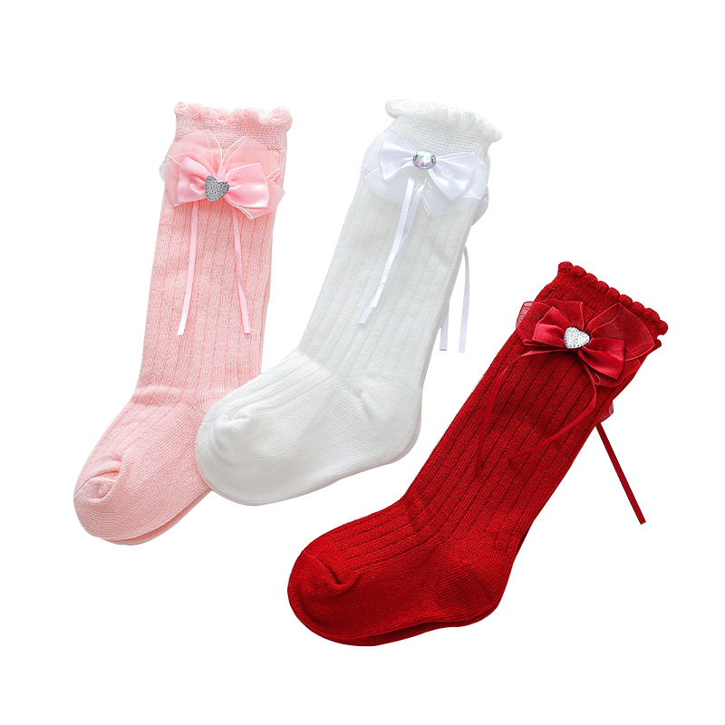 Calcetines de las niñas al por mayor de primavera y otoño calcetines de media pantorrilla de bebé niños de arco calcetines de princesa rojo brillante un mes de edad festivo