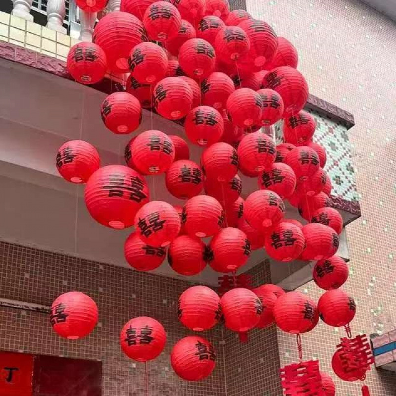Wedding red lanterns with the word "happy" for decoration in the bridal room, hanging ornaments for rural courtyard, Chinese-style wedding photo props