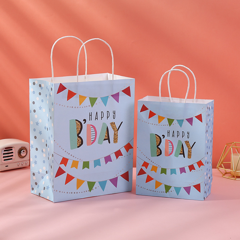 Bolsas de regalo de cumpleaños transfronterizas, bolsas de mano, bolsas de cartón, bolsas de embalaje, bolsas de regalo de dibujos animados en stock al por mayor