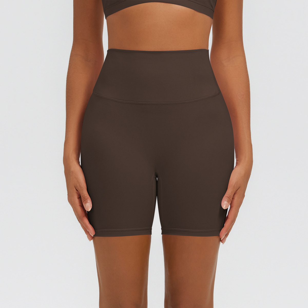 Nuevo tipo delgado de hielo, piel transpirable, ajustado, color sólido, ropa de yoga, pantalones cortos de tres puntos.