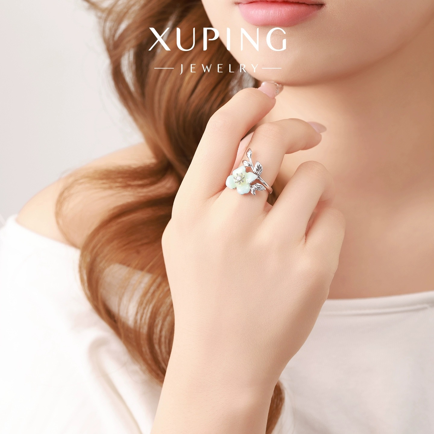 Xuping serie de goteo de moda de cuatro hojas de textura de flores anillo de hoja simple y fácil de usar suave viento anillo de otoño y invierno al por mayor