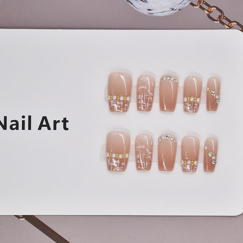 10 piezas de primavera <unk> viento manicure parche manicure falso manicure al por mayor productos terminados desmontables blanqueamiento explosivo usar uñas
