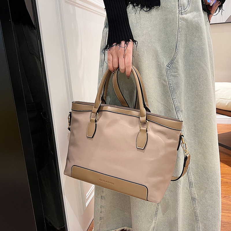 2024 transfronterizo nuevo nylon bolso de mano casual gran capacidad de color retro viaje mochila de hombro