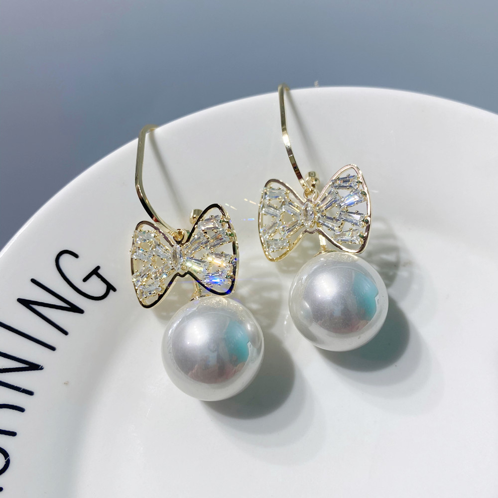 Korean Bowknot Pearl Earrings display picture 10